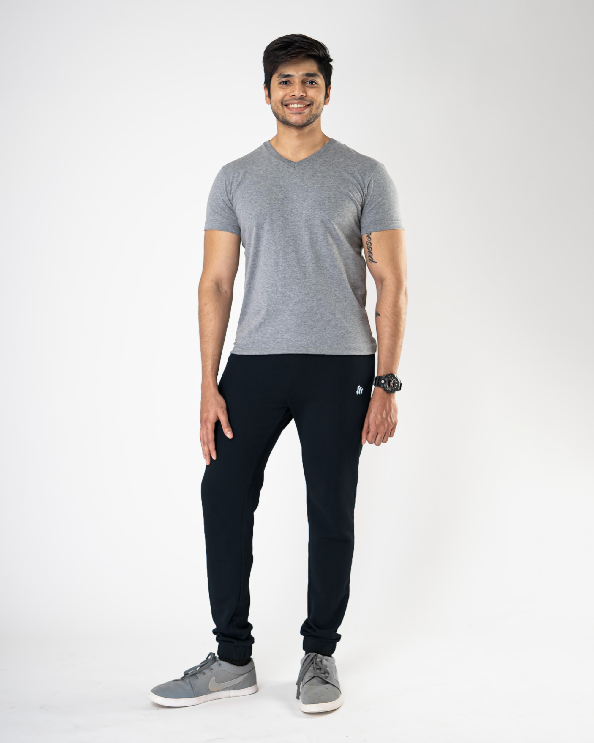 Grey joggers black online shirt